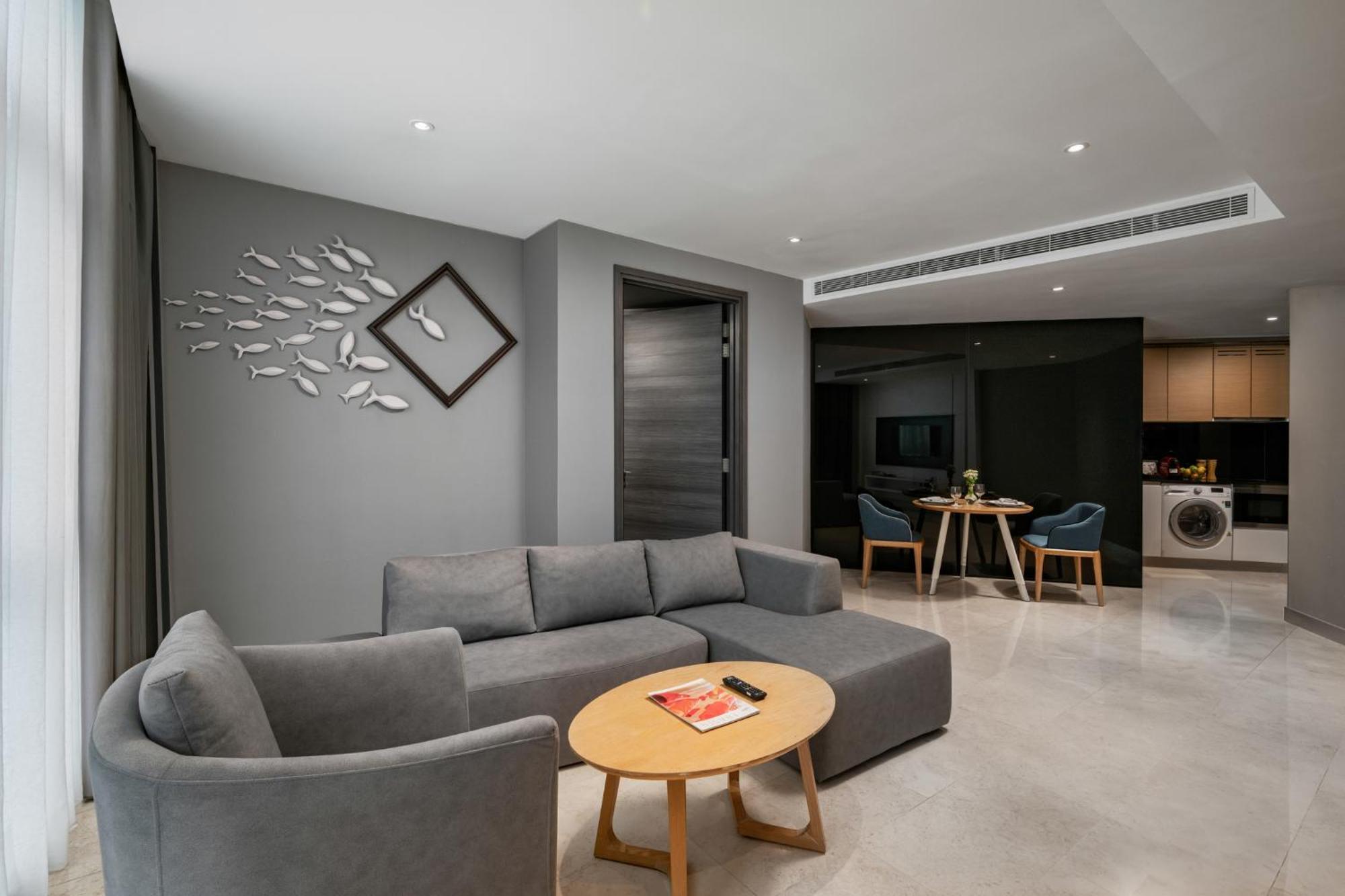 Fraser Place Puteri Harbour Nusajaya  Buitenkant foto A living room in a serviced apartment in Singapore